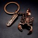 Metal keychain in the shape of a male scorpion. Copper color, size: length-3.8cm, width-2.3cm