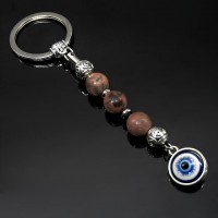 Keychain Talisman amulet made of natural stone Rhodonite