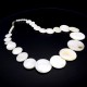 Beads made of natural mother-of-pearl, necklace made of circles of different sizes. Color white, beads length 49cm