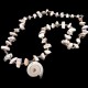 Beads made of natural shell Strombus luhuanus on a fishing line, beads length 60cm