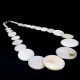 Beads made of natural mother-of-pearl, necklace made of circles of different sizes. Color white, beads length 49cm