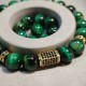 Men's bracelet made of natural stone tiger eye green