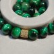 Men's bracelet made of natural stone tiger eye green