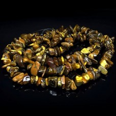 Natural stone beads on a fishing line *Tiger's eye*, crumbs, diameter 7-9 mm (+-), length 80-81 cm
