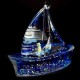 Souvenir desk pen stand in the shape of a sailboat with colored glitter gel and floating boats inside, size: 12*10cm