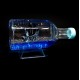 Souvenir table pen stand in the shape of a bottle with colored gel glitter and floating boats inside, size: 14,5*7,5*6 cm