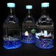 Souvenir table pen stand in the shape of a bottle with colored gel glitter and floating boats inside, size: 14,5*7,5*6 cm