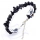 A set of beads and a bracelet on a fishing line with a lock made of natural stone black agate