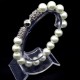 Bracelet Scales like natural pearls with an elastic band, metal fittings like silver, Mallorca beads diameter: 10mm, size: 19cm+