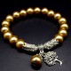 Bracelet with a pendant imitating natural Mallorca pearls, bronze color