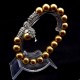 Bracelet with a pendant imitating natural Mallorca pearls, bronze color