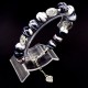 Glass beads bracelet. Diameter -12mm, color-black. The basis of the bracelet is a double strong fishing line with a lock, accessories - metal in silver, girth: 20cm+