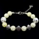 Bracelet made of glass beads and natural stone "Quartz" Basis: metallized thread, fittings: silver-like metal. Bead diameter: 12/10mm, girth: 19cm+