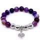 Bracelet with elastic band made of natural stone "Purple Agate" with a pendant, silver-tone metal fittings. Bead diameter: 10/10mm, girth: 19cm+