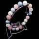 Bracelet with elastic band made of natural stone "Blue agate, Rose quartz, Rock crystal " metal silver fittings. Bead diameter: 10mm, girth: 19cm+