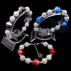 Bracelet made of glass beads and natural stone "Quartz" Color: mix, base: metallic thread, accessories: silver-like metal. Bead diameter: 12/10mm, girth: 19cm+