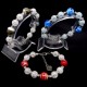 Bracelet made of glass beads and natural stone "Quartz" Color: mix, base: metallic thread, accessories: silver-like metal. Bead diameter: 12/10mm, girth: 19cm+
