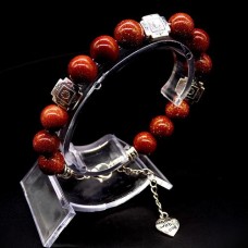 Bracelet made of natural stone *Aventurine gold sand* base metalized thread. Bead diameter: 10mm, girth: 19cm+