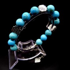 Natural stone bracelet *Turquoise* Metallized thread base. Bead diameter: 10mm, girth: 19.5cm+