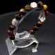 Bracelet made of natural stone "Tiger's eye" metallized thread, metal silver fittings. Bead diameter: 10mm, girth: 19cm+