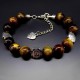 Bracelet made of natural stone "Tiger's eye" metallized thread, metal silver fittings. Bead diameter: 10mm, girth: 19cm+