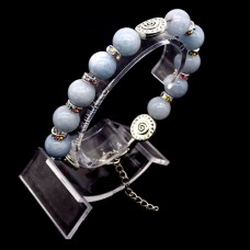 Bracelet made of natural stone *Blue Agate-Rock Crystal* metalized thread base. Bead diameter: 10mm, girth: 19cm+