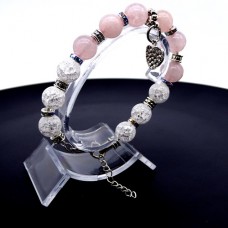 Bracelet made of natural stone *Rose Quartz-Rock Crystal* with a pendant, the base is a metallized thread. Bead diameter: 10mm, girth: 19cm+