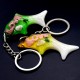 Acrylic keychain in the shape of a Dolphin with the inscription LOVE, inside a shell and multi-colored sequins. Color mix, size: height-3cm length-6.5cm