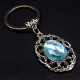 Keychain amulet in the form of a pendant, metal color silver, size: length-7.5cm, pendant-3.8/2.5cm