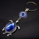 Keychain amulet Eye of Fatima in the form of a sea turtle, metal color silver, size: length-10cm, pendant-4.1/2.9cm