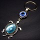 Keychain amulet Eye of Fatima in the form of a sea turtle, metal color silver, size: length-10cm, pendant-4.1/2.9cm