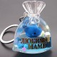 Acrylic water keychain in the form of a Bag with an inscription, inside the gel are multi-colored floating figurines with sparkles. Size: height-5.5cm, length-4.5cm