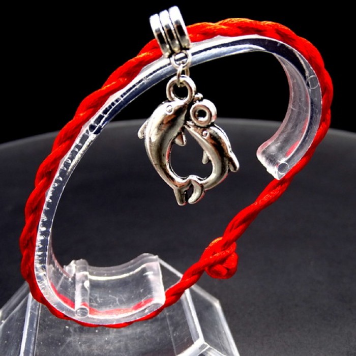 Bracelet red thread amulet against the evil eye with a pendant *Two Dolphins* metal color: silver, size: universal 12-19cm