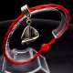 Bracelet red thread amulet against the evil eye with a pendant *sailboat* metal color: silver, size: universal 12-19cm