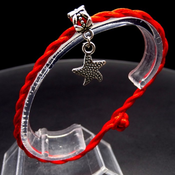 Bracelet red thread amulet against the evil eye with a pendant *Starfish* metal color: silver, size: universal 12-19cm