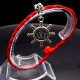 Bracelet red thread amulet against the evil eye with a pendant *Steering wheel* metal color: silver, size: universal 12-19cm