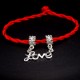 Bracelet red thread amulet against the evil eye with a pendant with rhinestones *LOVE* metal color: silver, size: universal 12-19cm