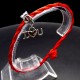 Bracelet red thread amulet against the evil eye with a pendant *LOVE* metal color: silver, size: universal 12-19cm