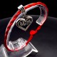 Bracelet red thread amulet against the evil eye with a pendant *LOVE* metal color: silver, size: universal 12-19cm