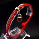 Bracelet red thread amulet against the evil eye with a pendant *Lock* plastic color: gold, size: universal 12-19cm