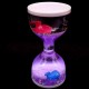 Hourglass antistress inside colored gel with sparkles and floating fish. Size: 11*5.5cm