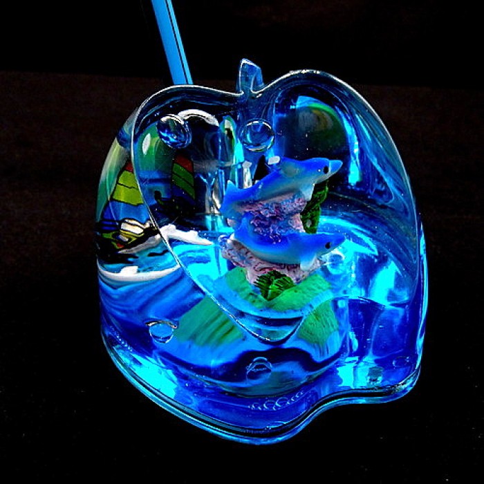 Souvenir antistress desktop pen holder in the shape of an apple inside colored gel and dolphins, size: 8*7cm