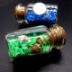 Glass bottle size: height 4cm, diameter 2.2cm, inside colored sand with sparkles and natural shell.