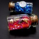 Glass bottle size: height 4cm, diameter 2.2cm, inside colored sand with sparkles and natural shell.