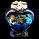 Marine souvenir glass bottle in the shape of a heart