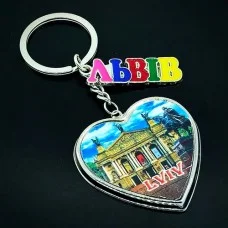Keychain Lions from metal in the form of a heart inside the foil is embossed
