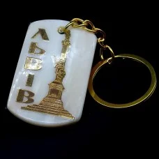 Lviv keychain cut from natural mother-of-pearl shell
