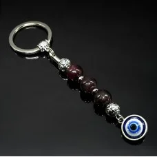 Keychain Talisman amulet made of natural stone Garnet