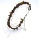 A set of beads and a bracelet on a fishing line with a lock made of natural stone Carnelian
