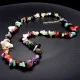 A set of beads and a bracelet on a fishing line with a lock made of natural stone Gems
